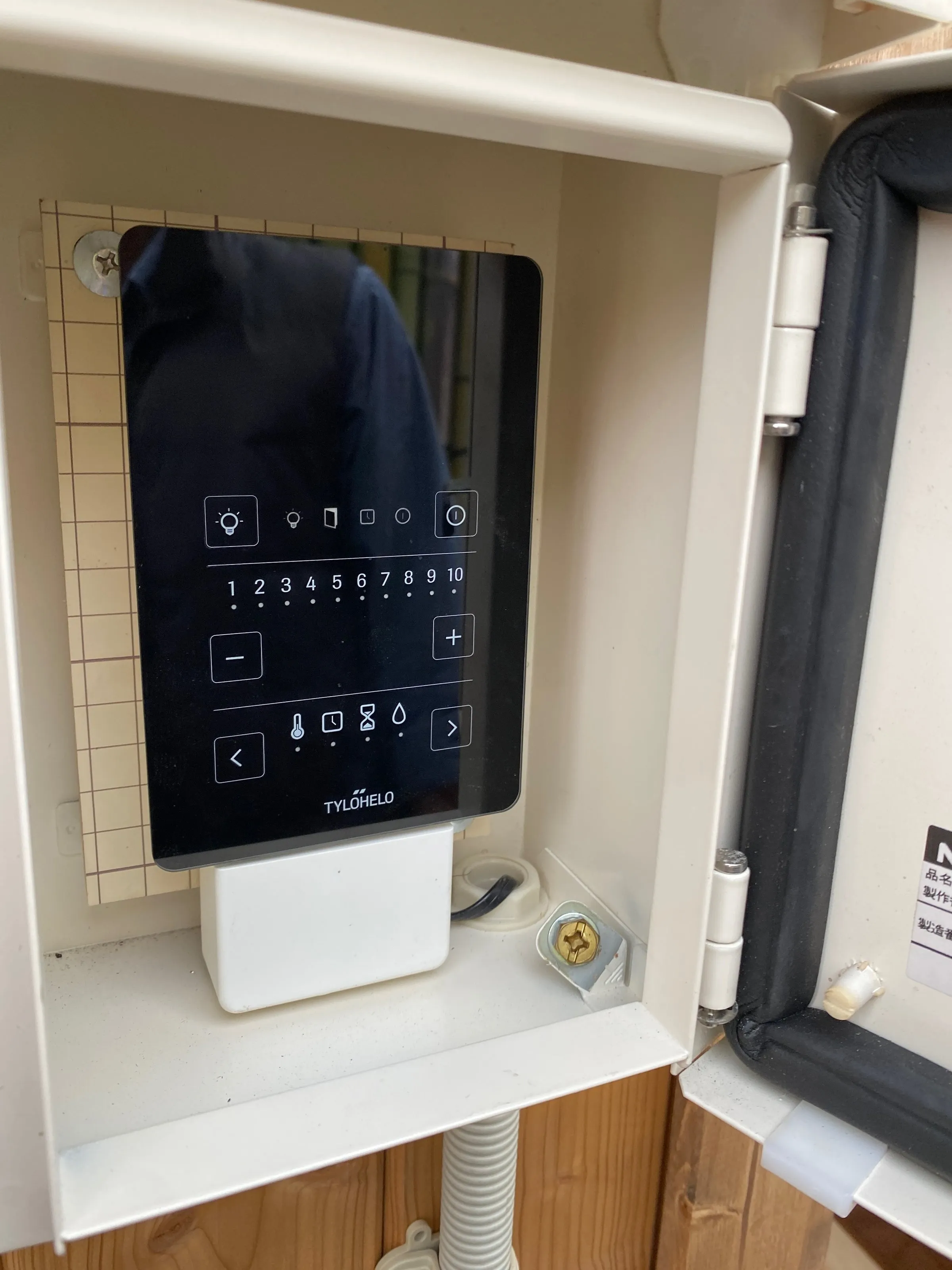 The Tylö Pure electric heater and its control panel