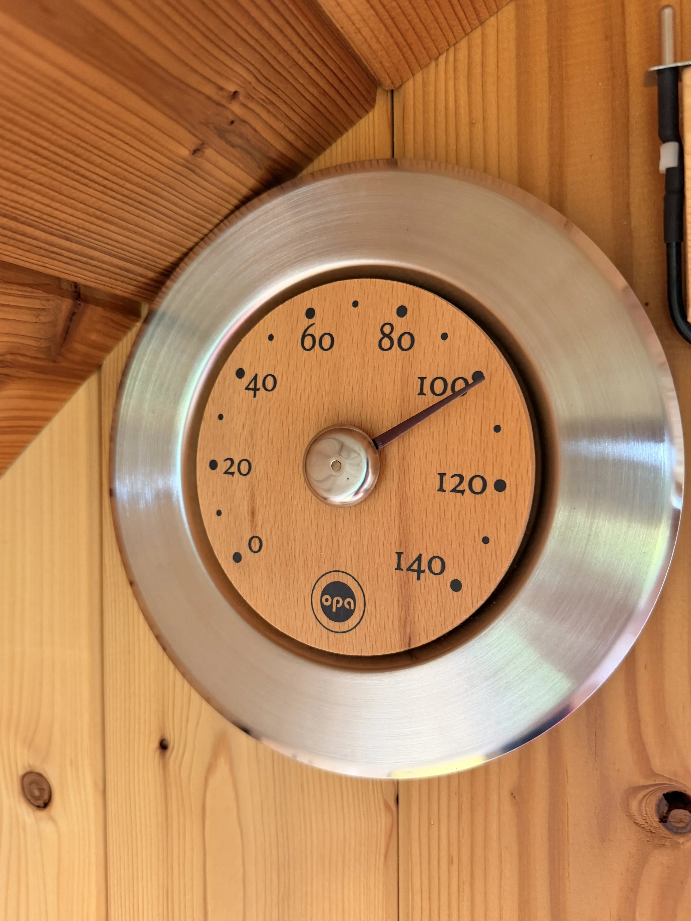 The in-cabin thermometer reading just past 100°C during a session